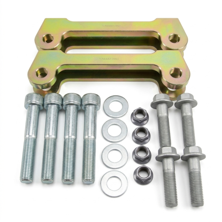 Pure Motorsport CNC brake adapter brackets for Brembo 4-piston calipers (300mm discs) on Clio 2 RS.